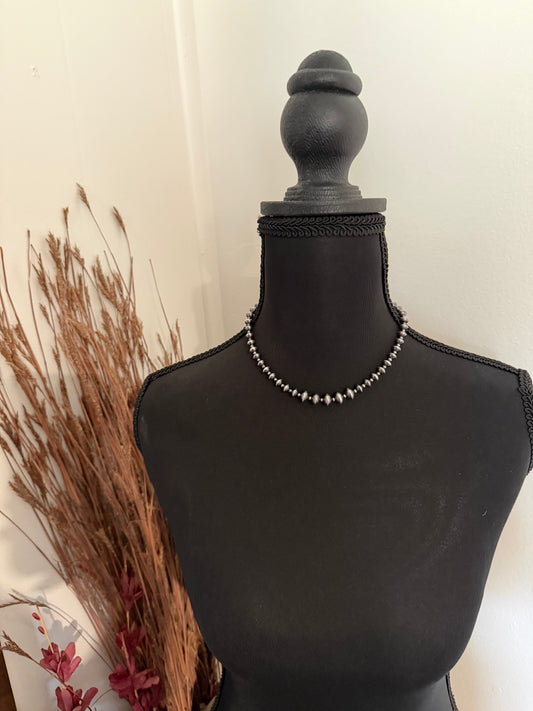 Graduated Saucer Necklace